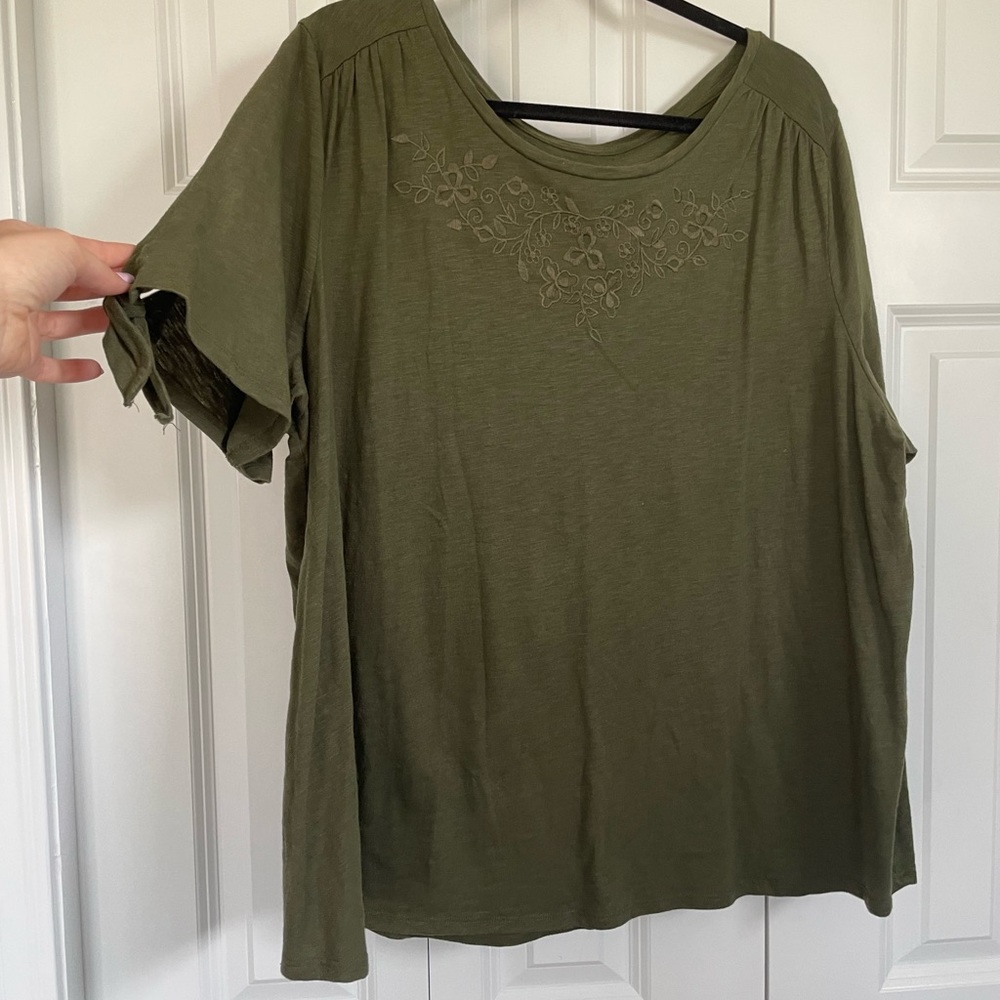 Woman’s green blouse